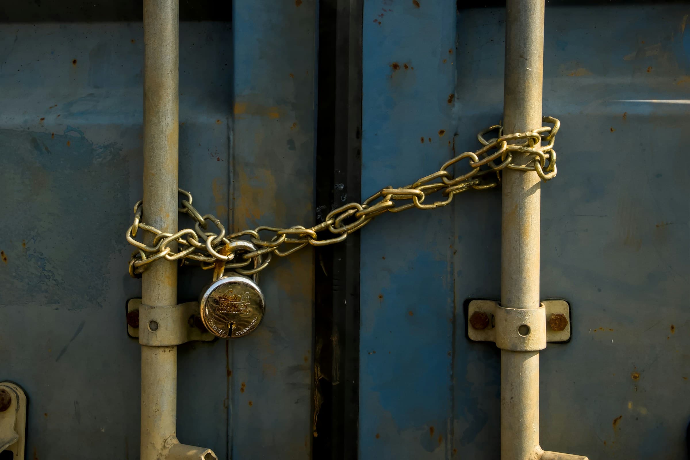 Docker Hardened Images: containers with security padlock and Docker logo on code background