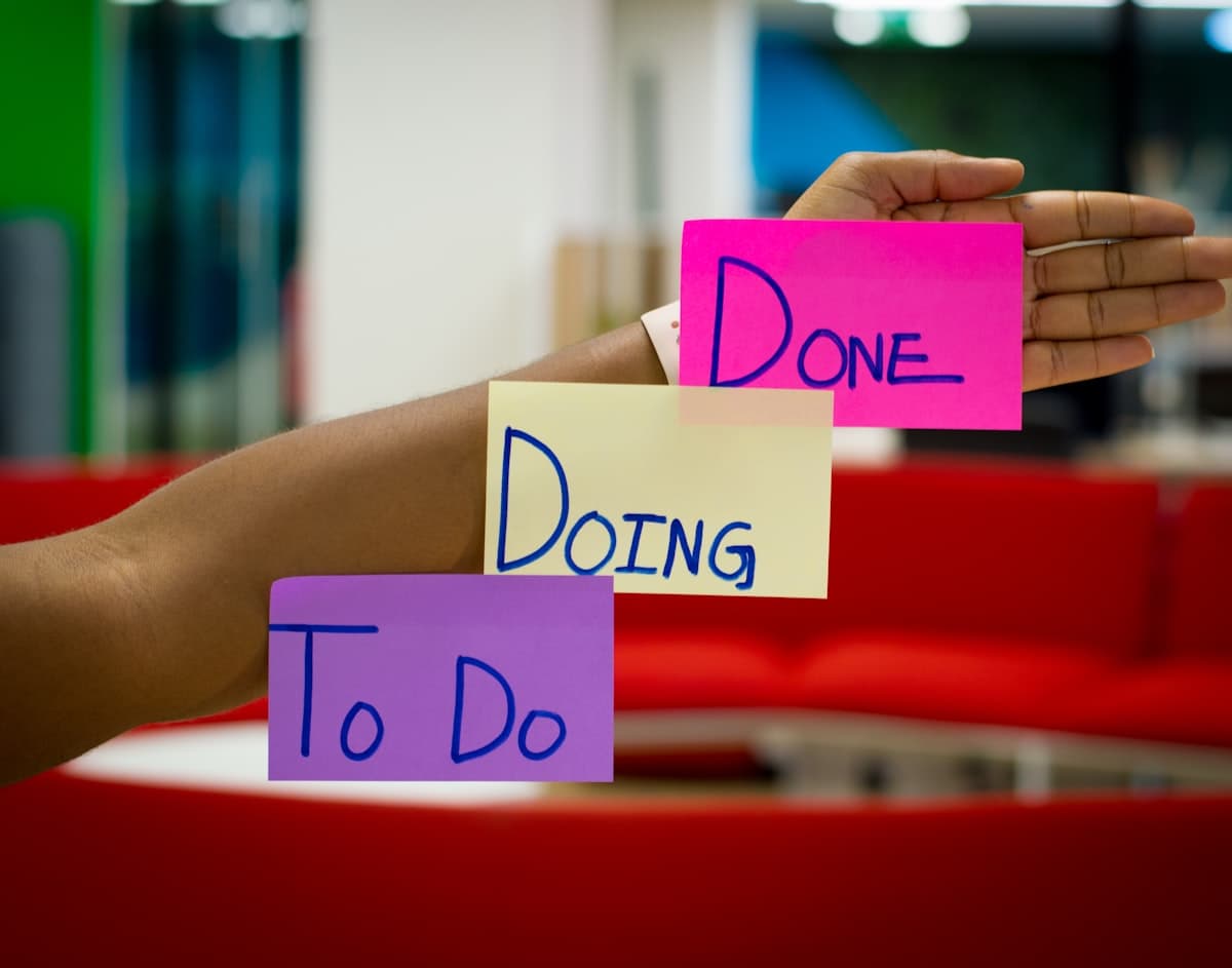 Kanban board with colorful sticky notes organized in task columns