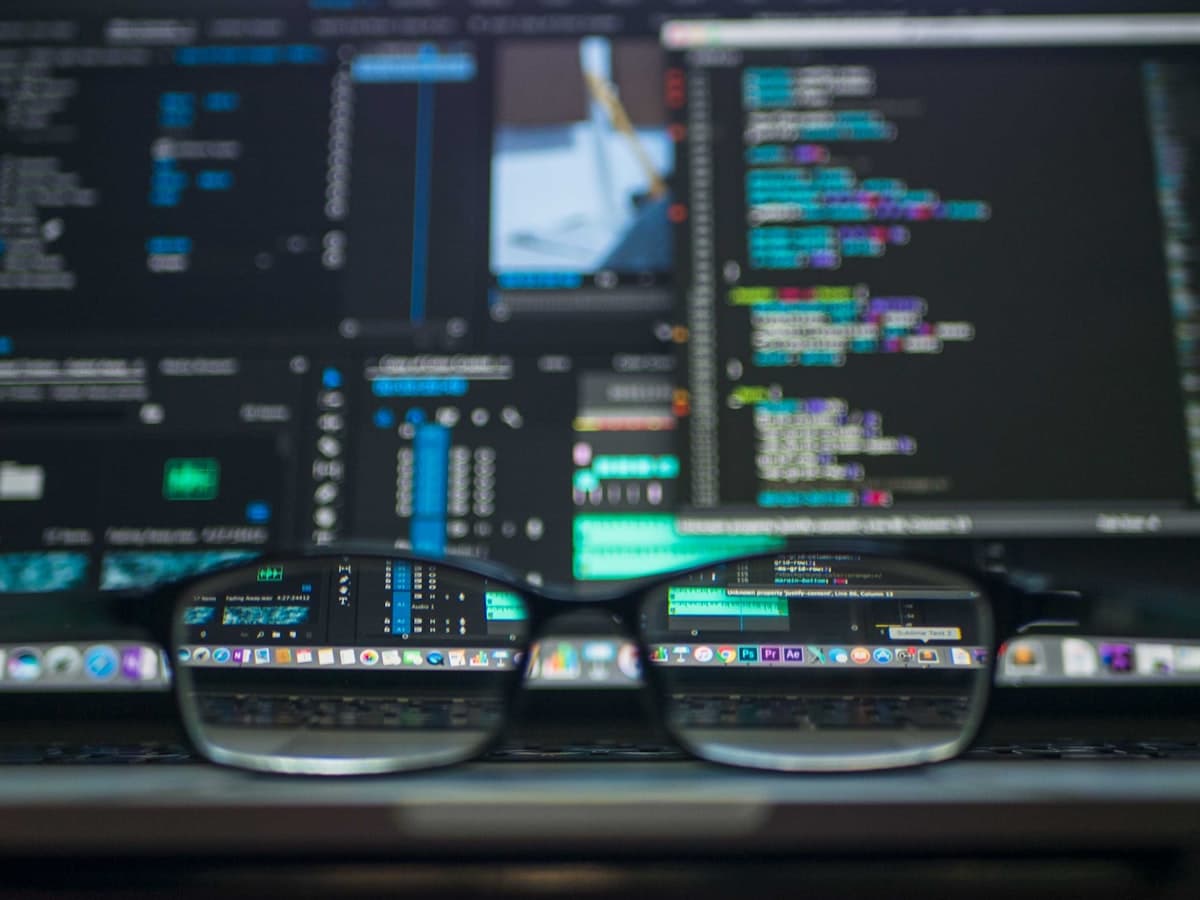 Programming code on computer screen representing AI model development like Kimi K2.5