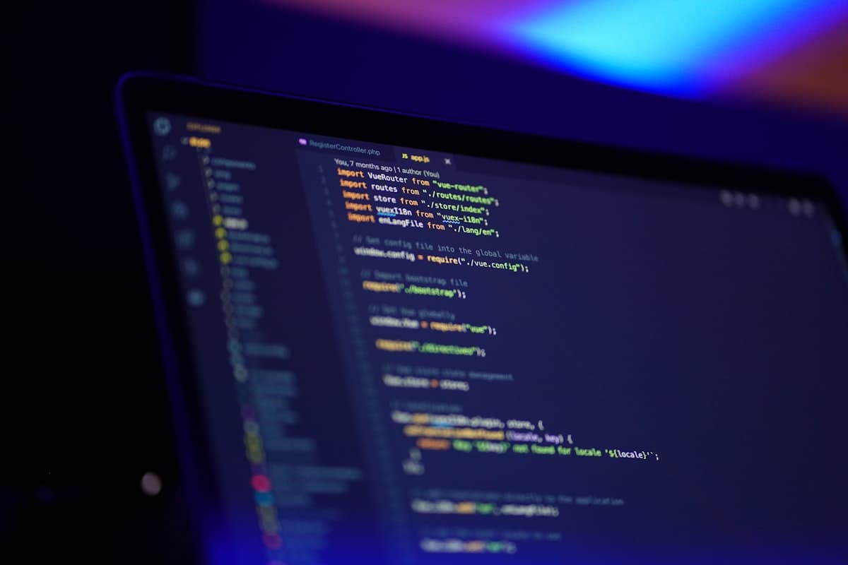 Programmer working with code on screen representing productivity with AI tools