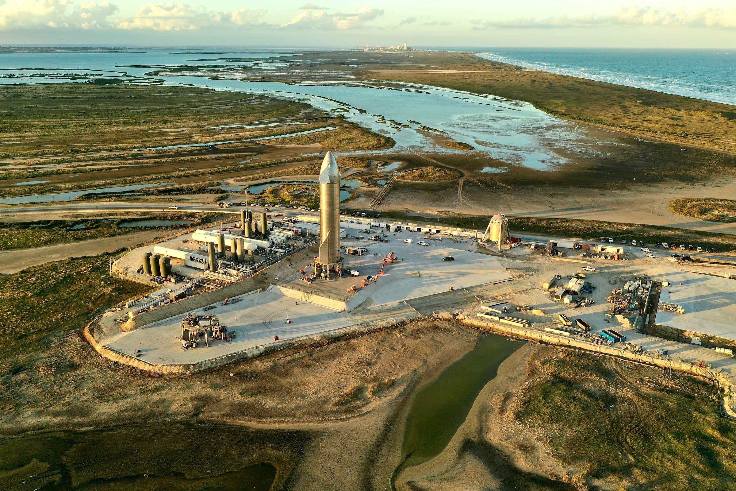 SpaceX GPU data center with a Starship rocket in the background, symbolizing the company's pivot into cloud compute